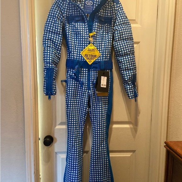 Goldbergh Other - Women’s ski one piece. Never worn, size US 4, blue with white stars. Goldbergh